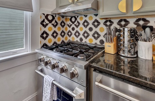 Inman Park Apartment | Enjoy both units of this stylish 5BR/5BA Inman Park duplex—perfect for families, business travelers, and groups. Walkable to top restaurants and the BeltLine. Features 2 kitchens, 3 fireplaces, front porch, pool table & private patios.