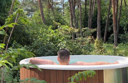 Wekerom House | Enjoy nature from the hottub and sauna