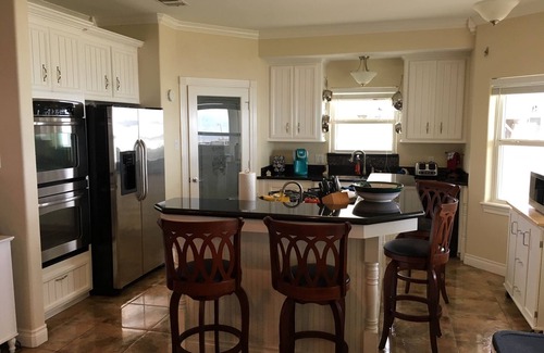 San Leon House | Entire Waterfront Home with 110Ft lighted private Fishing Pier on Galveston Bay!