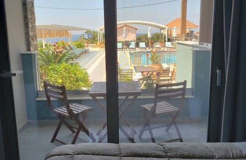 Anissaras Apartment | Entrance level renovated studio with sea& pool views