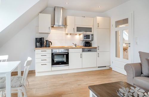 Greetsiel Apartment | Entspannter Urlaub am Hafen: Die Ferienwohnungen 'an't Diekstreek'!