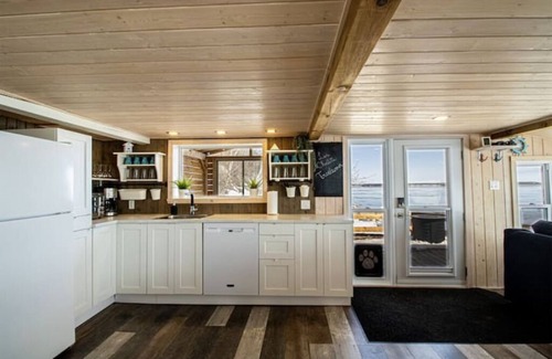 Grondines Cottage | Escape to Riverfront, Relax with Hot Tub, BBQ
