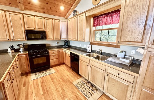 Wolf Laurel House | Escape to serene mountain bliss in this stunning mountain home.