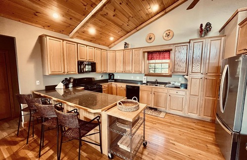 Wolf Laurel House | Escape to serene mountain bliss in this stunning mountain home.