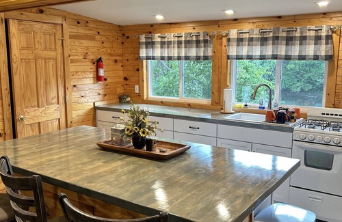 Winamac Cabin | Escape to The Riverside Hideaway - A Cozy Cabin With River Views!