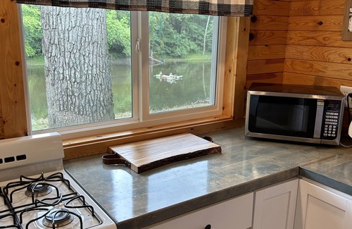 Winamac Cabin | Escape to The Riverside Hideaway - A Cozy Cabin With River Views!