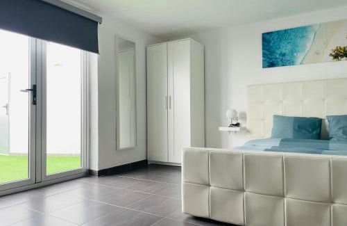 Tahiche Apartment | Estudio Grey by Vulcano Homes
