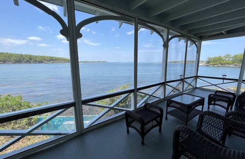 Pond Cove House | Evergreen cottage 5' from the water with private beach.