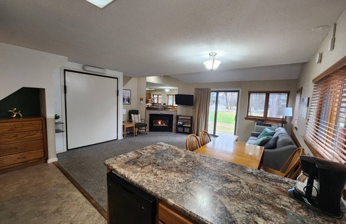 Bartlett Condo | Evergreen Lodge at Attitash Mountain base, ski, hot tubs, pool, WIFI & Fireplace