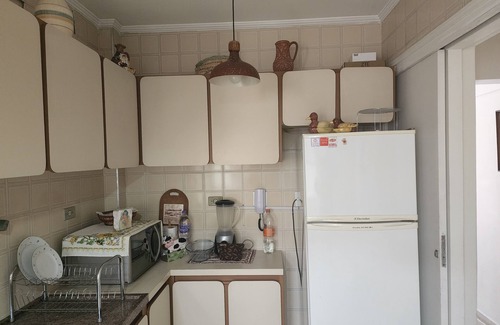 Pitangueiras Apartment | EXCELLENT LOCATION - PITANGUEIRAS BEACH WITH SEA VIEW. On the gastronomic boulevard