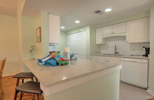 North Forest Beach Condo | Exceptional location! Across the street from the beach! Walk to Everything!