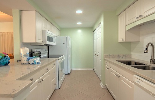 North Forest Beach Condo | Exceptional location! Across the street from the beach! Walk to Everything!