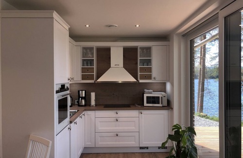 Arvika House | Exclusive and modern vacation home "Stora älg" directly on the lake 365 days a year!
