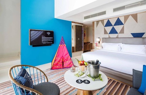 Farukolhufushi Island Hotel | Exclusive: Direct Beach Access and Overwater Villas at Hard Rock Maldives