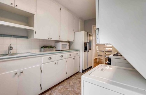 Uptown House | Exclusive Historical Townhome: serene and cozy
