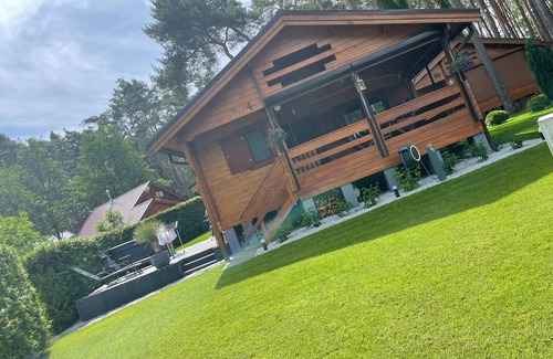 Lubrza House | Exclusive vacation home on the lake - beach, jacuzzi, boat