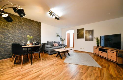 Cottbus Apartment | Exklusives-City-Apartment mit gratis Tiefgarage, Balkon, Waschtrockner, Netflix