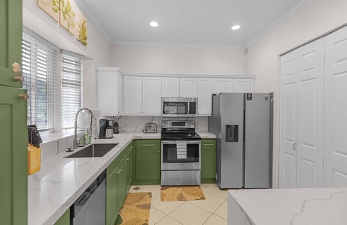 Herradura Condo | Experience a contemporary luxury condo with pool, gym, and beach club access.