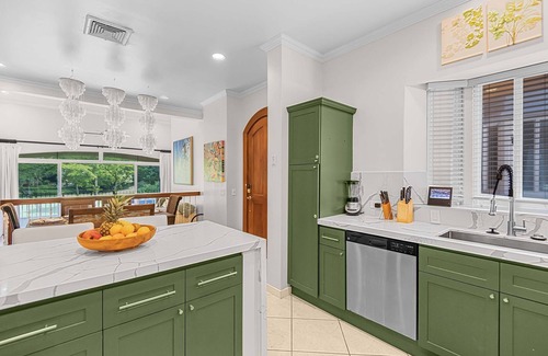 Herradura Condo | Experience a contemporary luxury condo with pool, gym, and beach club access.