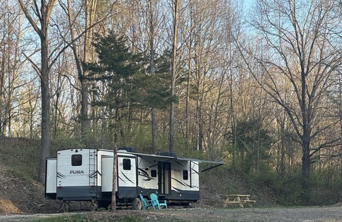 Carterville RV Rental | Experience Glamping in style. Private Lake - Pet Friendly!