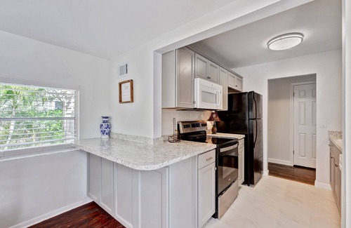 Parker Ridge House | Experience Serene Living: Charming 3/1 Home Walk to New Public Golf Course WPB!"