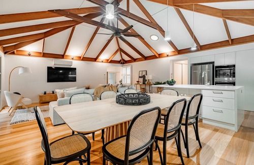 Mudjimba Apartment | Experience the epitome of luxury beachside living in this stunning home.