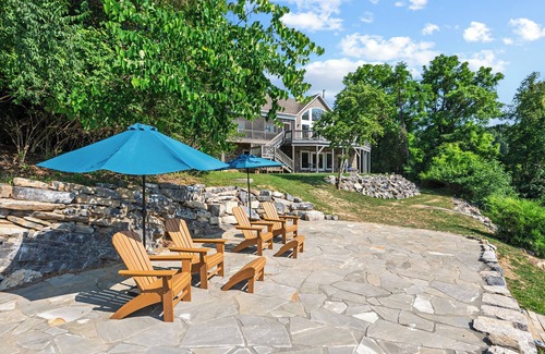 Pulaski House | Experience the perfect blend of rustic charm and modern luxury in this Claytor lakefront retreat