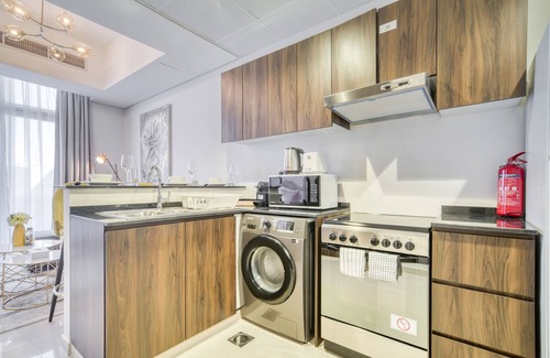Dubai House | Exquisite 4BR Townhouse at DAMAC Hills 2 Victoria by Deluxe Holiday Homes