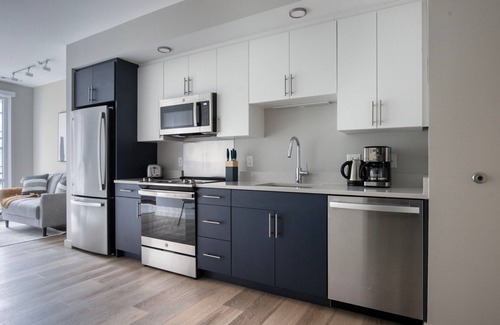 Boston Apartment | Exquisite Brighton Jr 1BR w/Gym & W/D, on the River, by Blueground