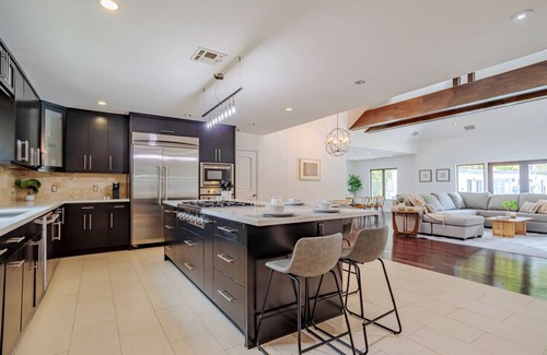 Sherman Oaks House | Exquisite Oasis Universal Pool slide laundry
