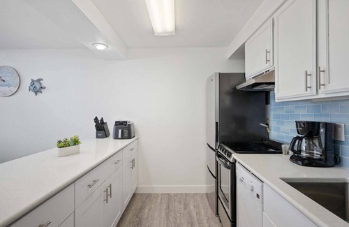 Rockaway Beach Condo | Exquisite Oceanfront and Beach Views at Rockaway Creek Inn, Patio and Living Bathed In Natural Light