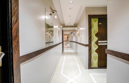 Jogeshwari West Hotel | FabExpress Amber Corp Inn - Nr NESCO Exhibition Center