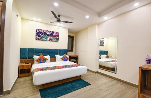 Kaushambi Hotel | FabHotel Angel Pink The Premium