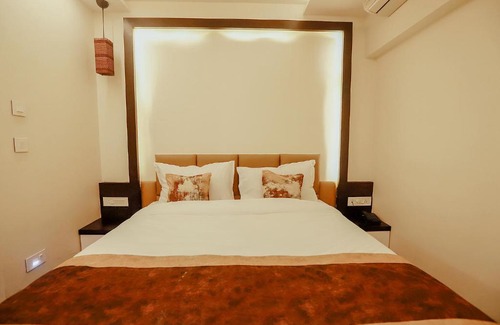 Maninagar Hotel | FabHotel Prime White Cloud