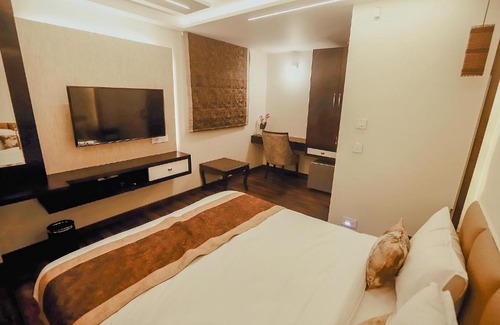 Maninagar Hotel | FabHotel Prime White Cloud