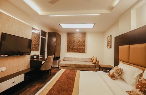 Maninagar Hotel | FabHotel Prime White Cloud