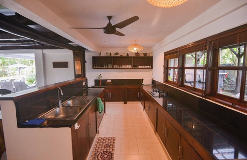 Dencarik Villa | Fabulous villa right on the beach with large pool, tropical garden & staff