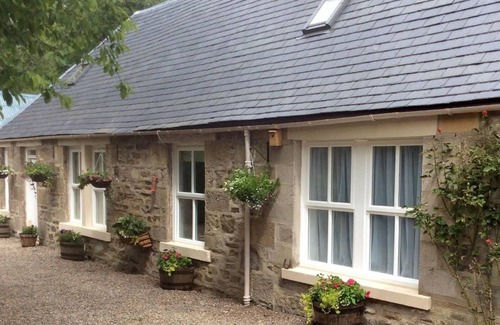 Glenlivet Cottage | Falls Cottage in Speyside on the edge of the stunning Cairngorms National Park.