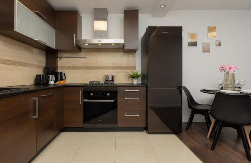 Saska Kepa Apartment | Family Apartment near PGE Narodowy by Noclegi Renters