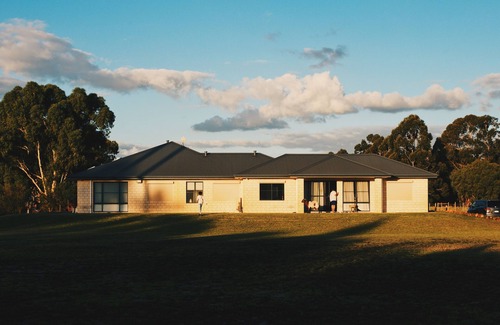 Oakford House | Family Farm Stay with Animals, Playground and Firepit
