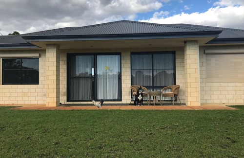 Oakford House | Family Farm Stay with Animals, Playground and Firepit