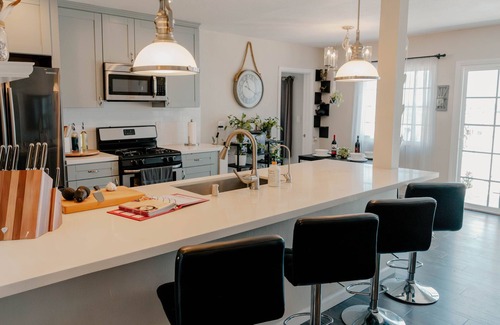 Valencia Park House | Family‑Friendly 4BR Home with City Skyline View