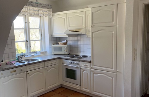 Wrixum Apartment | Family-friendly apartment with garden use, private terrace and beach chair
