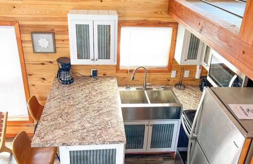 Seven Points RV Rental | Family-friendly cabin with EPIC amenities, pool, movie theatre, events & MORE!