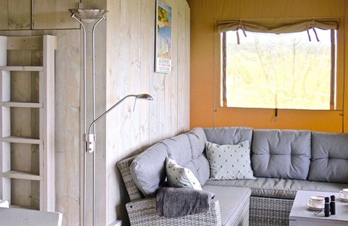 Les Arquets Cabin | Family friendly glamping tents: sleep 6, stunning sea and rural views