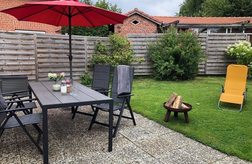 Grundhof Apartment | Family-friendly Krischan vacation apartment with quiet, fenced garden.