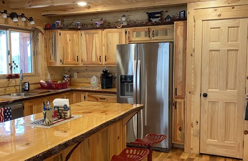Birchwood Cabin | Family log home nestled in the woods just minutes from trails.