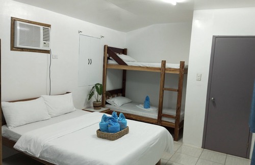 El Nido House | Family Room with a Garden View and a little bit away from the crowd.