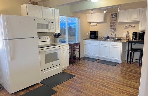Monument House | Family Time Basement Suite-Beauty Parlor, Play Room, Hot Tub, Yard, Fire pit
