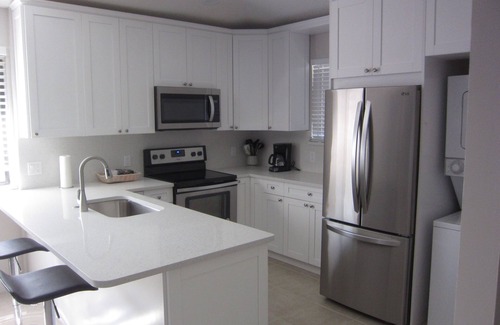 Palm Beach Gardens Condo | Fantastic PGA Club Cottage with Relaxing Pond and Fountain Views!